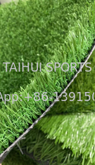 Rumput buatan 50mm rumput untuk lapangan olahraga sepak bola desain khusus berlubang